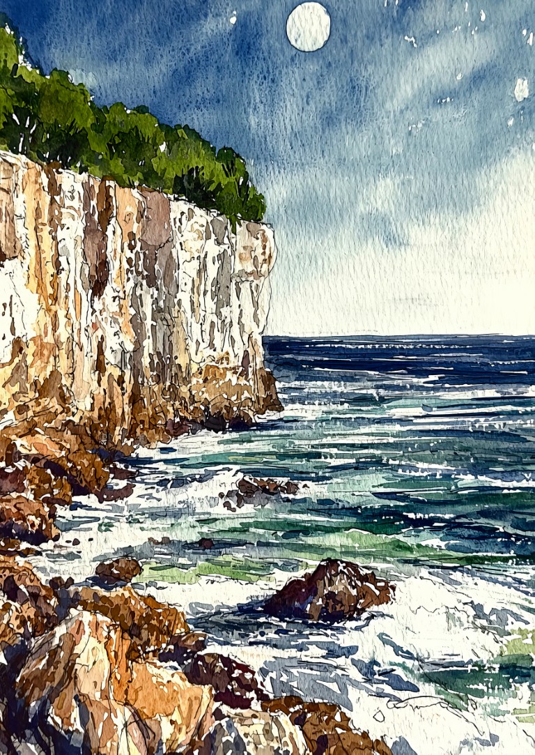 Serene coastal nightscape with gentle waves and towering cliffs